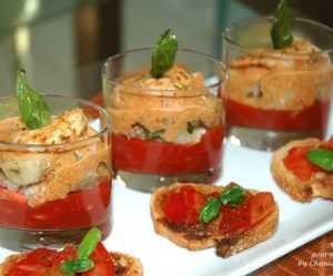 Vinaigrette de langoustines aux artichauts et tomates, crème de carapaces